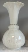 BELLEEK: A vase with fluted decoration.
