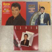 ELVIS PRESLEY: (American, 1935 - 1977): Three 12 inch vinyl record LP albums.