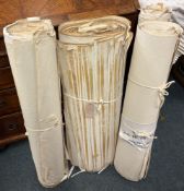 Four rolls of old ordnance survey maps.