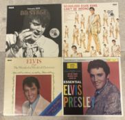 ELVIS PRESLEY: (American, 1935 - 1977): Four 12 inch vinyl record LP albums.