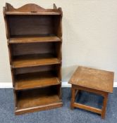 A small oak bookcase together with a small oak tab