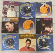ELVIS PRESLEY: (American, 1935 - 1977): Nine 7 inch vinyl record singles (reissues).