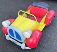 A child's old metal Noddy car.