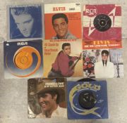 ELVIS PRESLEY: (American, 1935 - 1977): Eight 7 inch vinyl record singles (reissues).