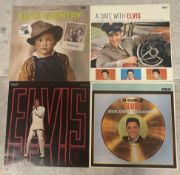 ELVIS PRESLEY: (American, 1935 - 1977): Four 12 inch vinyl record LP albums.