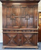 A large Continental hardwood TV cabinet.