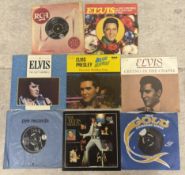 ELVIS PRESLEY: (American, 1935 - 1977): Eight 7 inch vinyl record singles (reissues).