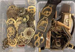 A large collection of horse brasses.