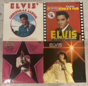 ELVIS PRESLEY: (American, 1935 - 1977): Four 12 inch vinyl record LP albums.