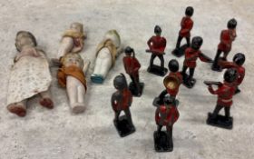 A collection of lead soldiers, dolls etc.