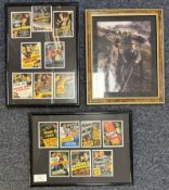 A collection of framed and glazed Rathbone trading cards.