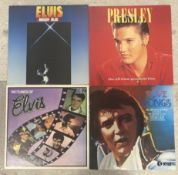 ELVIS PRESLEY: (American, 1935 - 1977): Four 12 inch vinyl record LP albums.