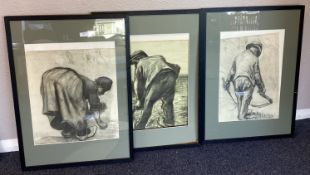 A trio of framed and glazed charcoal and chalk drawings.