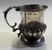 A 19th Century George III silver tankard.