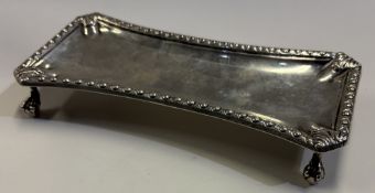 An 18th Century silver snuffers stand.