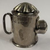 A rare novelty silver pepper.