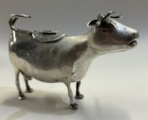A 19th Century Dutch silver cow creamer.