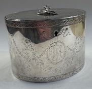 An 18th Century George III silver tea caddy.