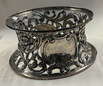 A chased Irish silver potato ring.