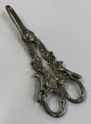 A pair of Victorian silver grape scissors.