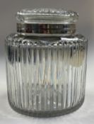 A Georgian silver-mounted glass tea caddy.