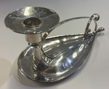 EDINBURGH: A rare Arts & Crafts silver chamberstick.