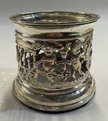 A silver bottle holder.