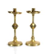 A pair of late 19th/early 20th century brass candlesticks in the Pugin manner, h. 27 cm