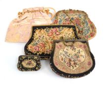 A group of five mid-20th century handbags/clutch bags, each florally decorated with brass finished