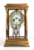 A French gilt metal cased four glass mantle clock, the white enamel dial with black Arabic