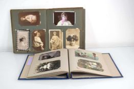 Two albums containing approx. one hundred and sixty postcards including greetings cards,