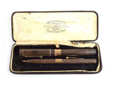 A cased pair of Waterman's Ideal pens with 9ct gold mounts