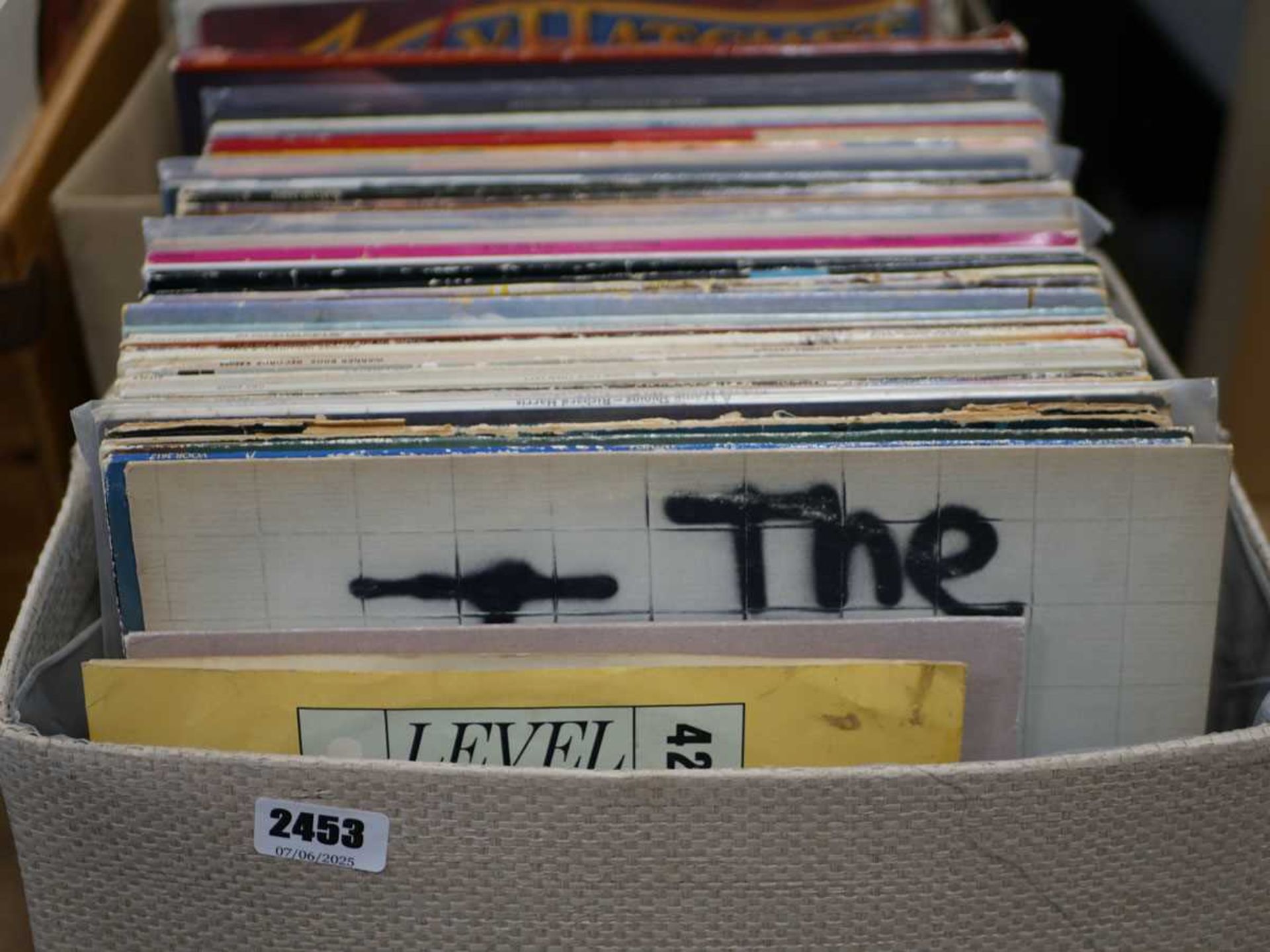 2 boxes containing various vinyl records