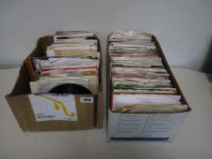 2 boxes of 7" singles incl. Bomb the Base, Eric Clapton, Billy Joe Royal, Dollar Very good