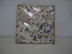 Led Zeppelin III Very good condition vinyl, good condition sleeve, some boxing and splits on the