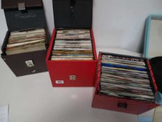 3 boxes of 7" singles incl. Toto, The Nolans, John Barry, Peter Frampton, ABBA Good condition,