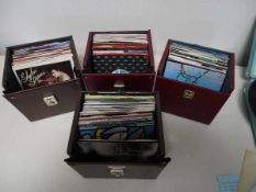 4 boxes containing 7" singles (mainly from 1980s) incl. Daryl Hall, Shakin' Stevens, Roy Orbison,