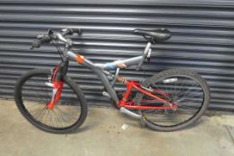 Outrage mountain bike in grey and red