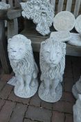 Large pair of concrete seated lions