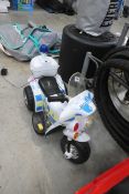 Childs battery operated ride on police motor bike with charger