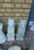 Pair of concrete seated gryphons