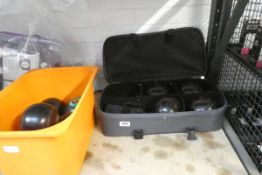 Cased set of 4 Henselite lawn bowls with 7 Aldeburgh lawn bowles