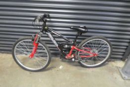 Boys Apollo FS24 mountain bike in black and red
