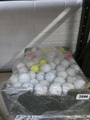 Large box of reclaimed golf balls