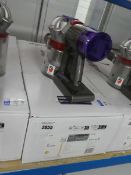 +VAT Dyson V8 Absolute stick vacuum cleaner with charger, head, pole and accessories