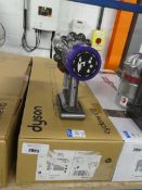 +VAT Dyson Cyclone V10 stick vacuum cleaner with battery, charger, pole and accessories