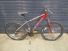 Carrera Kraken red and silver mountain bike