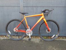 Boardman ADV8.9 red and orange racing bike