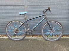 Carerra Axel Limited black mountain bike