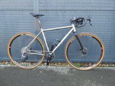 Planet X Tempest silver racing bike with titanium frame and Selscof front fork assembly